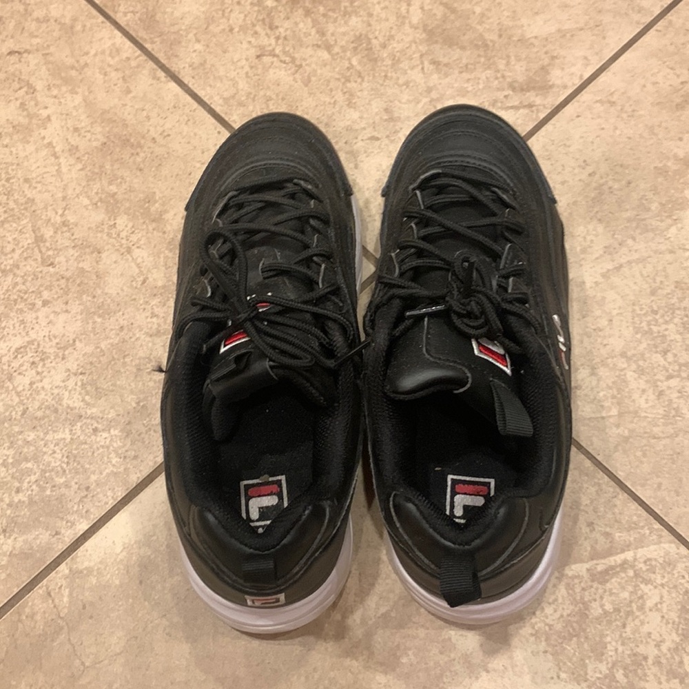 Black Filas. In great condition, size 8, super comfy, and looks great.